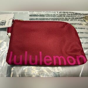 lululemon athletica Clippable card Pouch.  Berry rumble/ jeweled magenta.